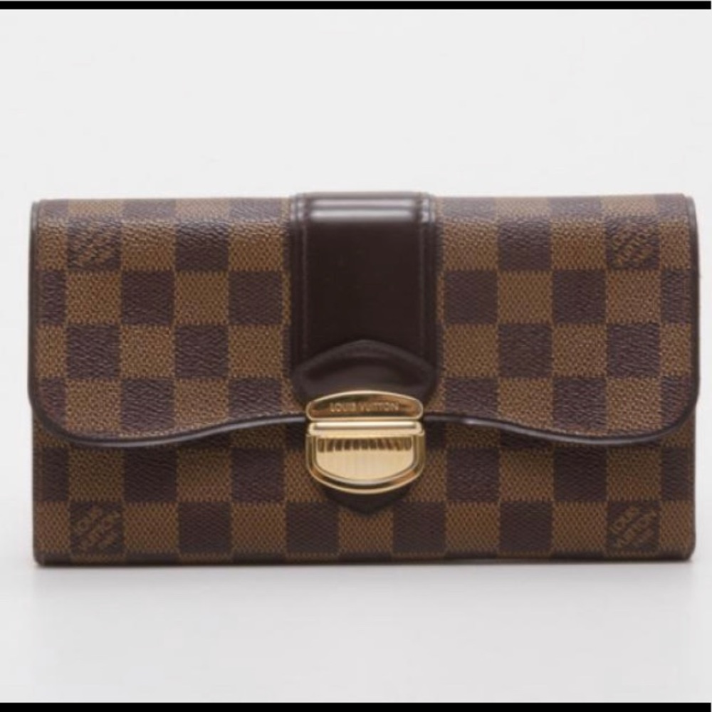 LOUIS VUITTON
Damier Ebene Sistina Wallet